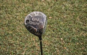 Restored vintage golf driver after professional repair